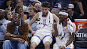 Nov 12, 2025; Oklahoma City, Oklahoma, USA; Oklahoma City Thunder guard Jalen Williams (8), center Chet Holmgren (7), and guard Shai Gilgeous-Alexander (2) talk while sitting on the bench during the fourth quarter against the Los Angeles Lakers at Paycom Center. Mandatory Credit: Alonzo Adams-Imagn Images