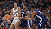 Penn State guard Myles Dread (2) defends against Purdue forward Trey Kaufman-Renn (4) in the Big Ten Tournament.  