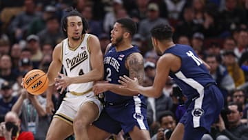 Penn State guard Myles Dread (2) defends against Purdue forward Trey Kaufman-Renn (4) in the Big Ten Tournament.  