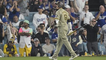 Oct 5, 2024; Los Angeles, California, USA; San Diego Padres third baseman Manny Machado (13) called out on strikes in the eighth inning agains the Los Angeles Dodgers during game one of the NLDS for the 2024 MLB Playoffs at Dodger Stadium. Mandatory Credit: Jayne Kamin-Oncea-Imagn Images