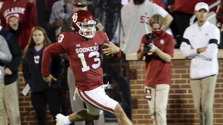 Oct 16, 2021; Norman, Oklahoma, USA;  Oklahoma Sooners quarterback Caleb Williams (13) runs for a