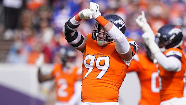 Denver Broncos defensive end Zach Allen (99) reacts after a play during the first half against the New York Giants.
