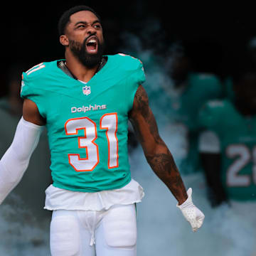 Dec 22, 2024; Miami Gardens, Florida, USA; Miami Dolphins running back Raheem Mostert (31) reacts as he enters the field before the game against the San Francisco 49ers at Hard Rock Stadium. Mandatory Credit: Sam Navarro-Imagn Images