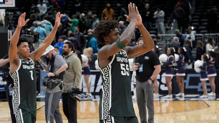 Michigan State guard Jeremy Fears Jr. (1) and Michigan State forward Coen Carr (55) acknowledge the State fans clapping for him at the end of the 2026 NCAA Men's Basketball East Regional game against UConn at Capital One Arena in Washington DC on Friday, March 27, 2026. 
Michigan State lost the game 67-63.