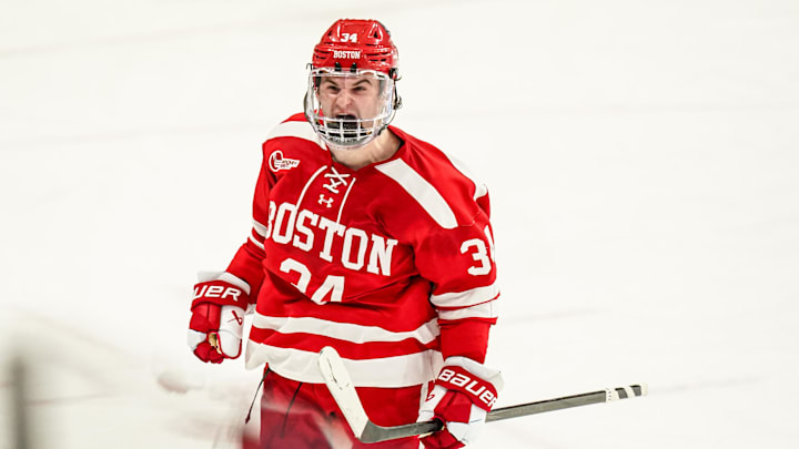 Feb 25, 2025; Storrs, CT, USA; Boston University forward Cole Eiserman (34) reacts after scoring against UConn in a shoot-out after the third period at Toscano Family Ice Forum. Mandatory Credit: David Butler II-Imagn Images