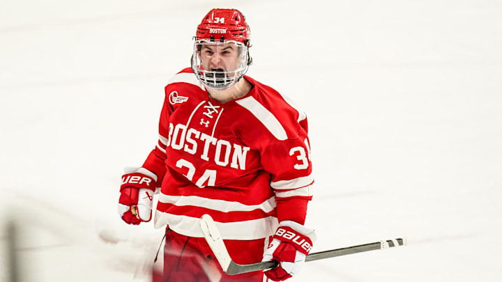 Feb 25, 2025; Storrs, CT, USA; Boston University forward Cole Eiserman (34) reacts after scoring against UConn in a shoot-out after the third period at Toscano Family Ice Forum. Mandatory Credit: David Butler II-Imagn Images