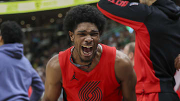 Dec 2, 2023; Salt Lake City, Utah, USA; Portland Trail Blazers guard Scoot Henderson (00) reacts to a play against the Utah Jazz during the second half at Delta Center. Mandatory Credit: Rob Gray-Imagn Images