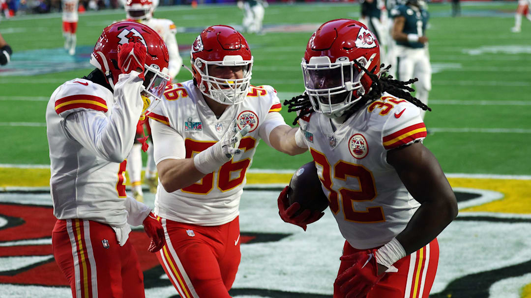 Feb 12, 2023; Glendale, Arizona, US; Kansas City Chiefs linebacker Nick Bolton (32) celebrates with safety Bryan Cook (6) and defensive end George Karlaftis (56) after running for a touchdown after recovering a fumble against the Philadelphia Eagles in the second quarter of Super Bowl LVII at State Farm Stadium. Mandatory Credit: Bill Streicher-Imagn Images