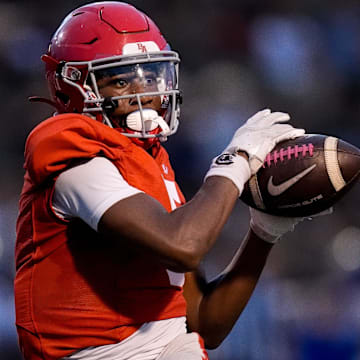 Brentwood Academy's Eli Ferguson (5) receives a pass against Brentwood during the first half at Brentwood Academy in Brentwood, Tenn., Friday, Aug. 30, 2024.