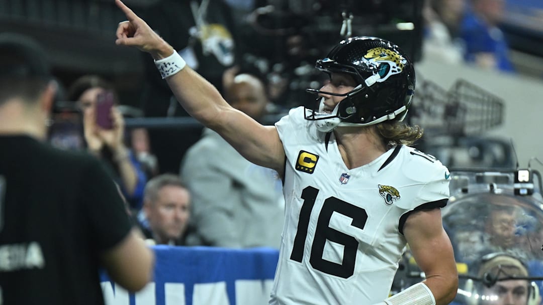 Dec 28, 2025; Indianapolis, Indiana, USA; Jacksonville Jaguars quarterback Trevor Lawrence (16) reacts after a touchdown during the second half against the Indianapolis Colts at Lucas Oil Stadium. Mandatory Credit: Robert Goddin-Imagn Images