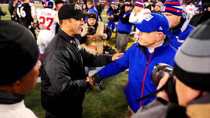 December 23, 2012;Baltimore, MD,USA; Baltimore Ravens head coach John Harbaugh (left) shakes hands with New York Giants head coach Tom Coughlin (right) after the Ravens beat the Giants 33-14 at M&T Bank Stadium. Mandatory Credit: Evan Habeeb-Imagn Images