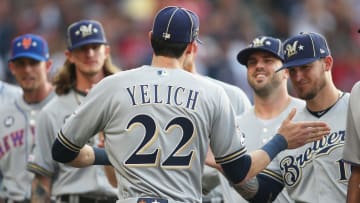 Jul 9, 2019; Cleveland, OH, USA;  National League starting right fielder Christian Yelich (22) greets his Milwaukee Brewers teammates before the 2019 MLB All Star Game at Progressive Field. Mandatory Credit: Charles LeClaire-USA TODAY Sports