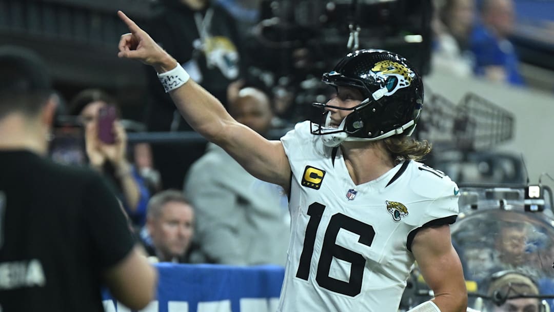Dec 28, 2025; Indianapolis, Indiana, USA; Jacksonville Jaguars quarterback Trevor Lawrence (16) reacts after a touchdown during the second half against the Indianapolis Colts at Lucas Oil Stadium. Mandatory Credit: Robert Goddin-Imagn Images