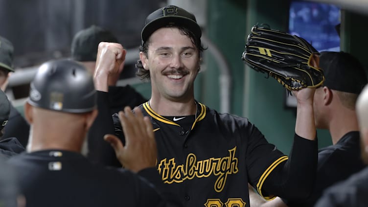 Sep 9, 2024; Pittsburgh, Pennsylvania, USA;  Pittsburgh Pirates starting pitcher Paul Skenes (30) reacts in the dugout after pitching the sixth inning against the Miami Marlins at PNC Park. Mandatory Credit: Charles LeClaire-Imagn Images