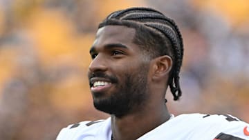 Oct 12, 2025; Pittsburgh, Pennsylvania, USA; Cleveland Browns quarterback Shedeur Sanders (12) watches the action against the Pittsburgh Steelers during the fourth quarter at Acrisure Stadium. Mandatory Credit: Barry Reeger-Imagn Images