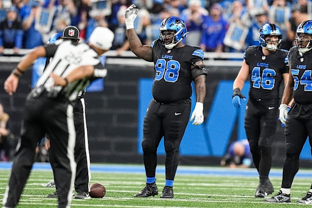 Detroit Lions defensive tackle DJ Reader asks for crowd noise before a play against the Buffalo Bills.