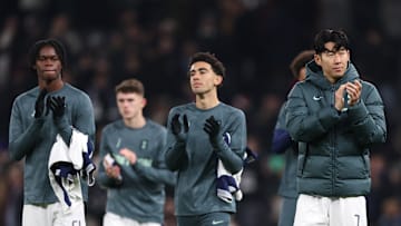 Spurs players acknowledge the fans after the game