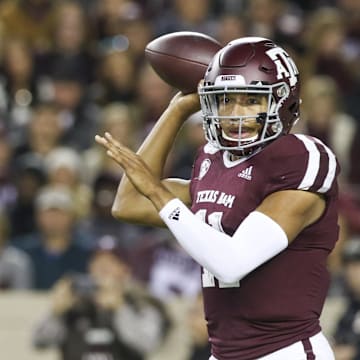 Nov 16, 2019; College Station, TX, USA; Texas A&M Aggies quarterback Kellen Mond (11) sets up to throw a pass during the first quarter against the South Carolina Gamecocks at Kyle Field. Mandatory Credit: John Glaser-Imagn Images