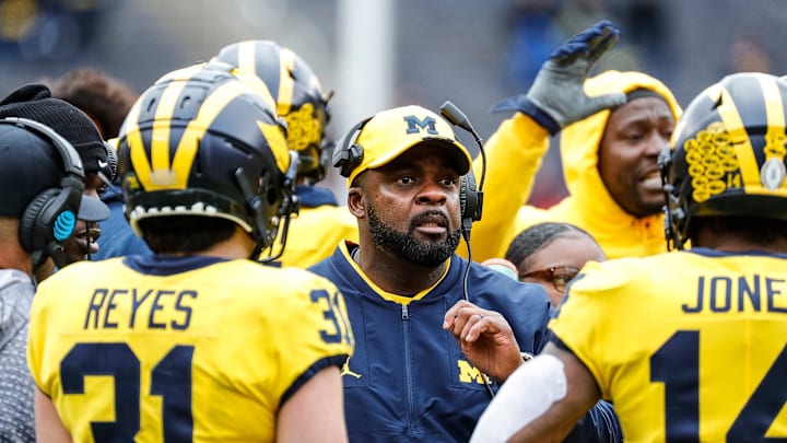 Michigan defensive run game coordinator and linebackers coach Brian Jean-Mary talks to Maize Team players during the second half of the spring game at Michigan Stadium in Ann Arbor on Saturday, April 20, 2024.