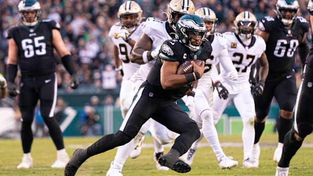 Philadelphia Eagles quarterback Jalen Hurts (1) runs the ball against the New Orleans Saints 