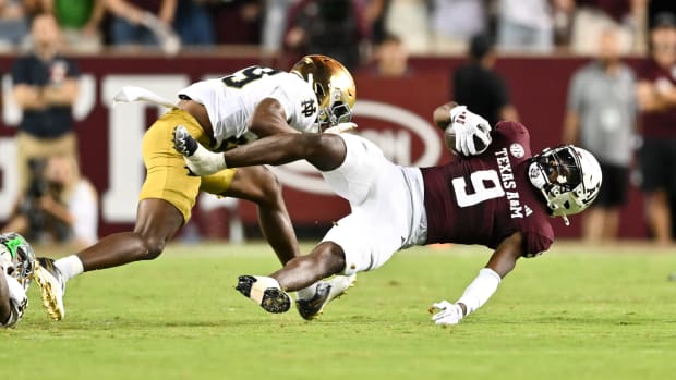 Notre Dame's Christian Gray makes a tackle against Texas A&M