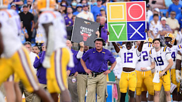Sep 4, 2021; Pasadena, California, USA; Louisiana State Tigers head coach Ed Orgeron watches game action against the UCLA Bruins during the first half the at the Rose Bowl. Mandatory Credit: Gary A. Vasquez-Imagn Images