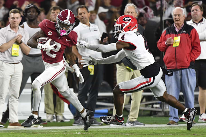 Alabama Crimson Tide wide receiver Ryan Williams breaks a tackle to score a touchdown against the Georgia Bulldogs. 