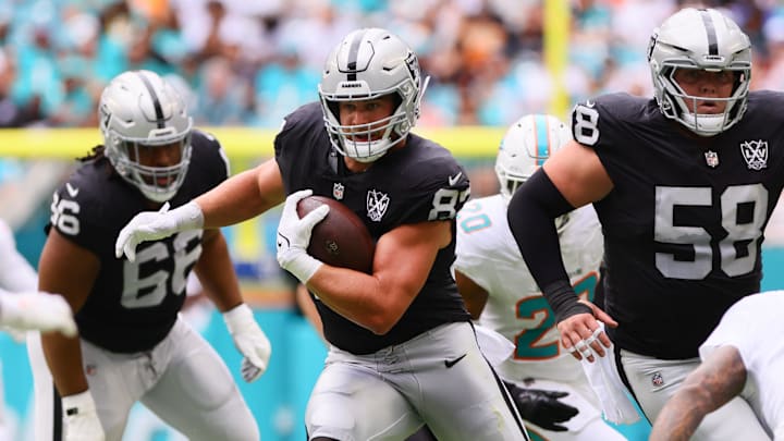 Nov 17, 2024; Miami Gardens, Florida, USA; Las Vegas Raiders tight end Michael Mayer (87) runs with the football against the Miami Dolphins during the first quarter at Hard Rock Stadium. Mandatory Credit: Sam Navarro-Imagn Images Nov 17, 2024; Miami Gardens, Florida, USA; Las Vegas Raiders tight end Michael Mayer (87) runs with the football against the Miami Dolphins during the first quarter at Hard Rock Stadium. Mandatory Credit: Sam Navarro-Imagn Images