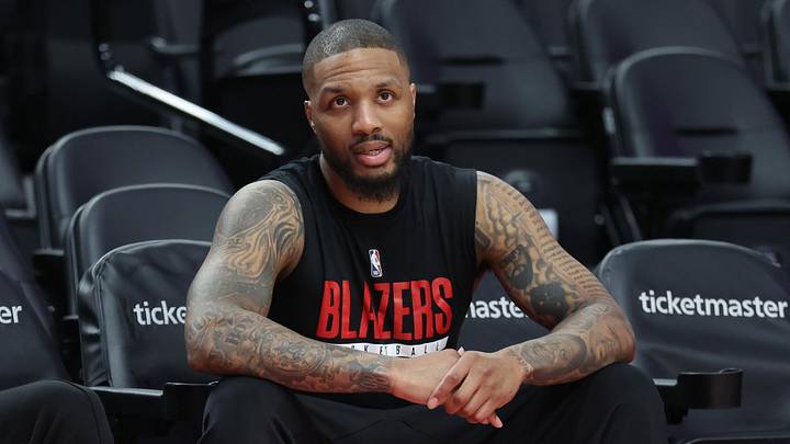Apr 10, 2026; Portland, Oregon, USA;  Portland Trail Blazers guard Damian Lillard (0) watches his teammates during warm ups before the Trail Blazers play against the LA Clippers at Moda Center. Mandatory Credit: Jaime Valdez-Imagn Images