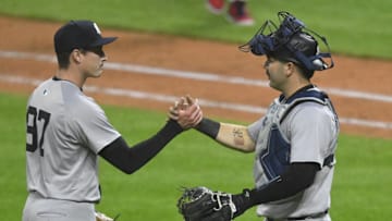Apr 13, 2024; Cleveland, Ohio, USA; New York Yankees relief pitcher Ron Marinaccio (97) and catcher