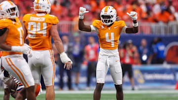Aug 30, 2025; Atlanta, Georgia, USA; Tennessee Volunteers defensive back Ty Redmond (4) reacts after a stop against the Syracuse Orange in the second quarter at Mercedes-Benz Stadium. Mandatory Credit: Brett Davis-Imagn Images
