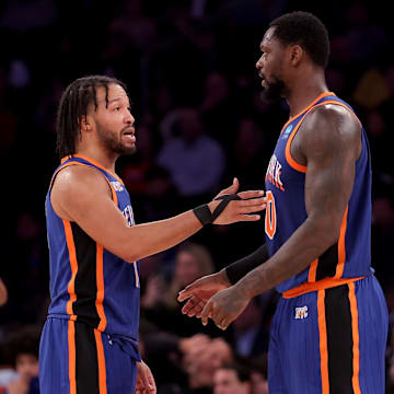 New York Knicks guard Jalen Brunson (11) talks to forward Julius Randle (30) during the third quarter against the Toronto Raptors at Madison Square Garden. Mandatory Credit: Brad Penner-Imagn Images