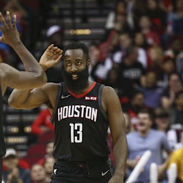 Nov 27, 2019; Houston, TX, USA; Houston Rockets guard James Harden (13) celebrates with forward Danuel House Jr. (4) after a play against the Miami Heat during the second quarter at Toyota Center. Mandatory Credit: Troy Taormina-Imagn Images