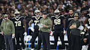 Oct 26, 2025; New Orleans, Louisiana, USA;  New Orleans Saints head coach Kellen Moore stands on the sidelines during the second quarter against the Tampa Bay Buccaneers at Caesars Superdome. Mandatory Credit: Stephen Lew-Imagn Images