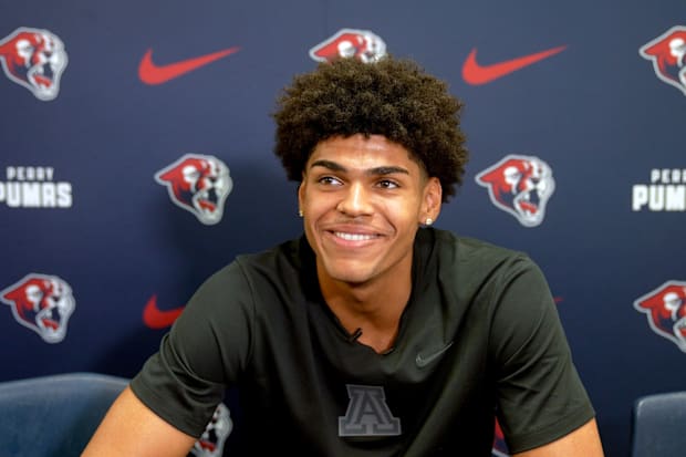 Koa Peat smiles during an event.