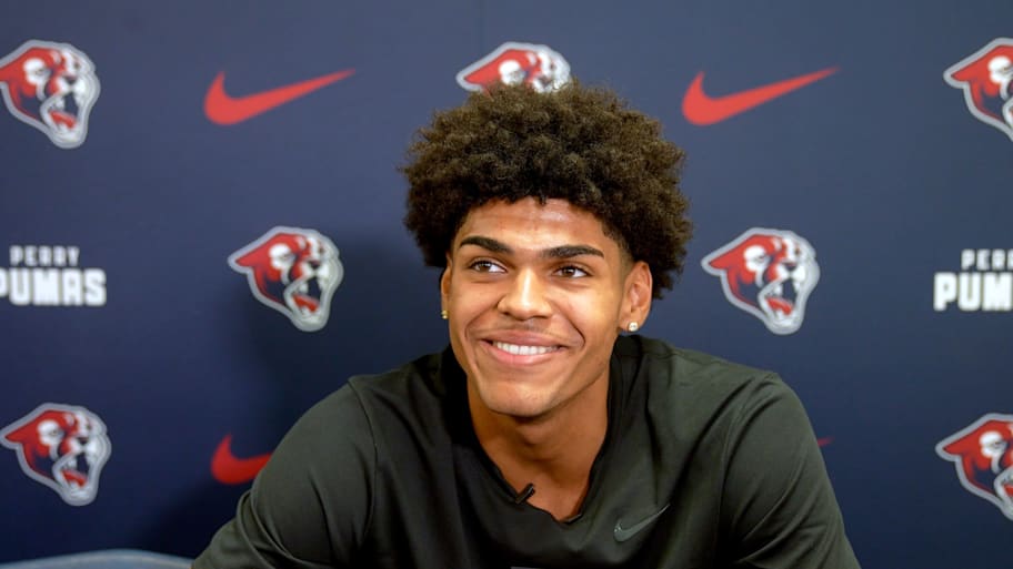 Koa Peat smiles during an event.