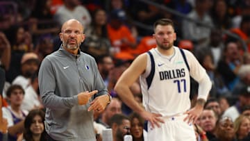 Oct 26, 2024; Phoenix, Arizona, USA; Dallas Mavericks head coach Jason Kidd with guard Luka Doncic (77) against the Phoenix Suns in the first half at Footprint Center. Mandatory Credit: Mark J. Rebilas-Imagn Images