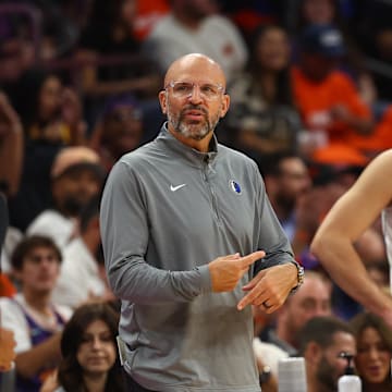 Oct 26, 2024; Phoenix, Arizona, USA; Dallas Mavericks head coach Jason Kidd with guard Luka Doncic (77) against the Phoenix Suns in the first half at Footprint Center. Mandatory Credit: Mark J. Rebilas-Imagn Images