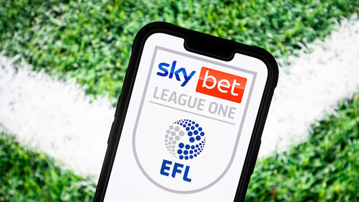 In this photo illustration, a Sky Bet League One logo seen...