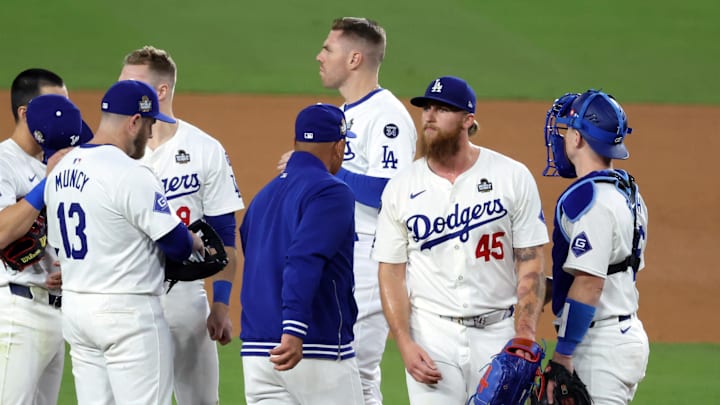 Oct 25, 2024; Los Angeles, California, USA; Los Angeles Dodgers manager Dave Roberts (30) relieves pitcher Michael Kopech (45) in the ninth inning against the New York Yankees during game one of the 2024 MLB World Series at Dodger Stadium. Mandatory Credit: Kiyoshi Mio-Imagn Images Oct 25, 2024; Los Angeles, California, USA; Los Angeles Dodgers manager Dave Roberts (30) relieves pitcher Michael Kopech (45) in the ninth inning against the New York Yankees during game one of the 2024 MLB World Series at Dodger Stadium. Mandatory Credit: Kiyoshi Mio-Imagn Images
