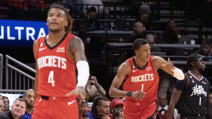 Nov 14, 2022; Houston, Texas, USA; Houston Rockets guard Jalen Green (4) reacts to forward Jabari Smith Jr. (1) three point basket against the LA Clippers in the first quarter at Toyota Center. Mandatory Credit: Thomas Shea-USA TODAY Sports