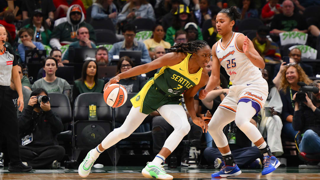 May 23, 2025; Seattle, Washington, USA; Seattle Storm forward Nneka Ogwumike (3) dribbles the ball towards the basket while defended by Phoenix Mercury forward Alyssa Thomas (25) during the second half at Climate Pledge Arena. Mandatory Credit: Steven Bisig-Imagn Images