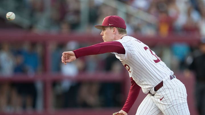 Florida State Seminoles pitcher Cooper Whited (32) pitches to a batter. The Florida State Seminoles hosted the Florida Gators at Dick Howser Stadium on Tuesday, April 7, 2026.
