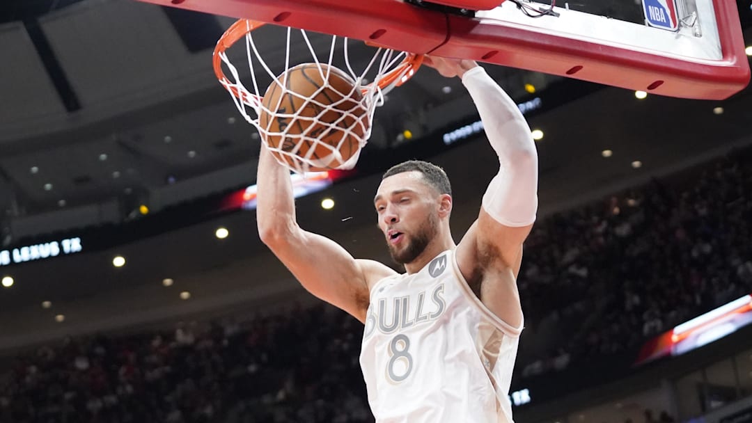 Jan 25, 2025; Chicago, Illinois, USA; Chicago Bulls guard Zach LaVine (8) dunks the ball against the Philadelphia 76ers during the first quarter at United Center. Mandatory Credit: David Banks-Imagn Images