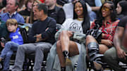 WNBA star Angel Reese sits courtside for an NBA game between the Chicago Bulls and Orlando Magic. 