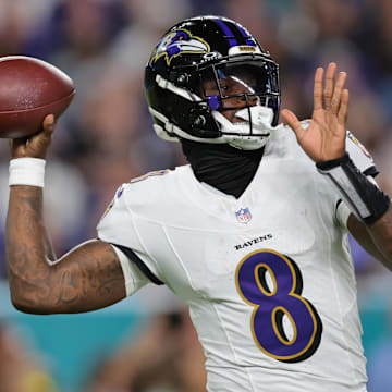 Oct 30, 2025; Miami Gardens, Florida, USA; Baltimore Ravens quarterback Lamar Jackson (8) throws downfield during the second quarter against the Miami Dolphins at Hard Rock Stadium. Mandatory Credit: Sam Navarro-Imagn Images
