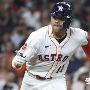 Jul 8, 2025; Houston, Texas, USA; Houston Astros right fielder Cam Smith (11) points toward the dugout after hitting a single during the third inning against the Cleveland Guardians at Daikin Park