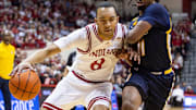 Indiana's Bryson Tucker (8) drives against UNC Greensboro at Simon Skjodt Assembly Hall. 