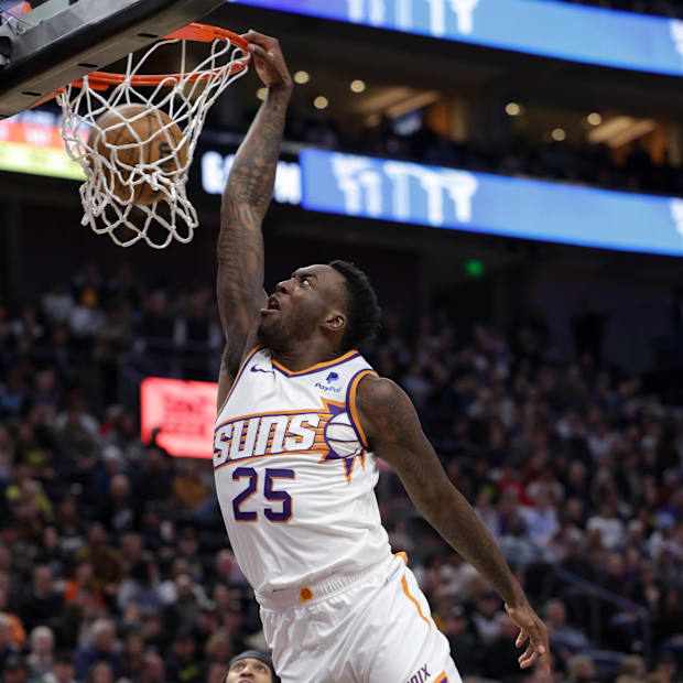 Phoenix Suns forward Nassir Little (25) dunks against the Utah Jazz during the first quarter at Delta Center.