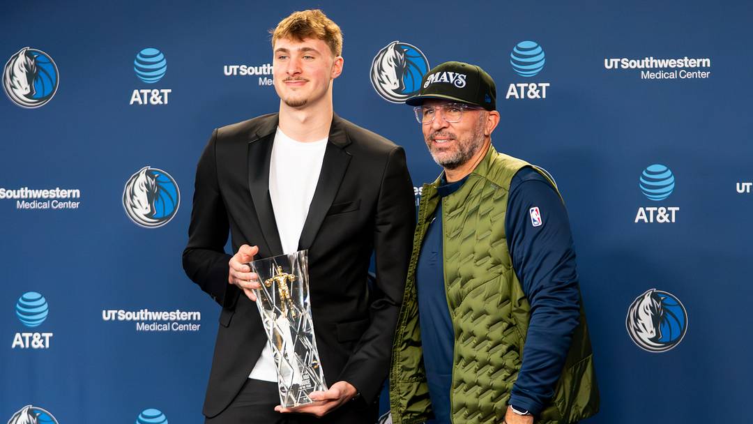 Apr 29, 2026; Dallas, TX, USA;  Dallas Maverick Cooper Flagg holds the  2025-26 NBA Rookie of the Year trophy 